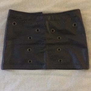 Leather miniskirt with metal hardware studs